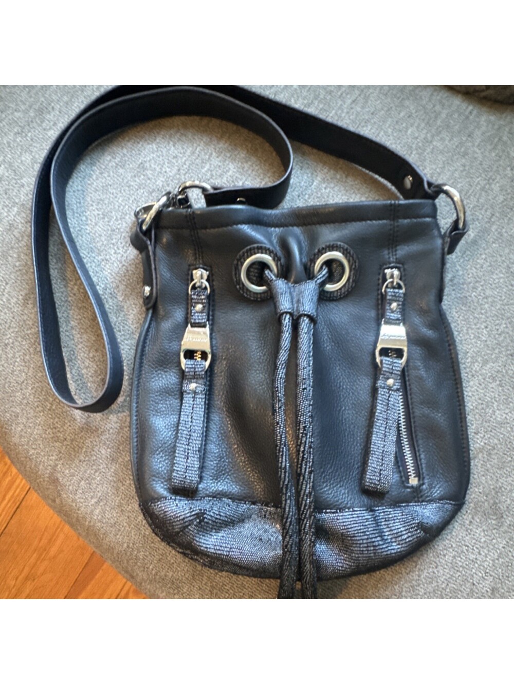 B. Makowsky Black Pebbled Leather Shoulder Bag Tassel Zip Grommet Accent Purse